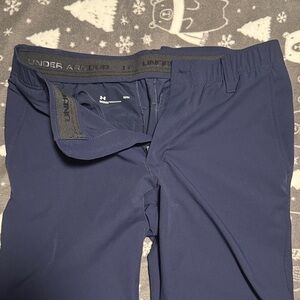 Blue Under Armour golf pant 33x34 and khaki under armour golf short 33 W